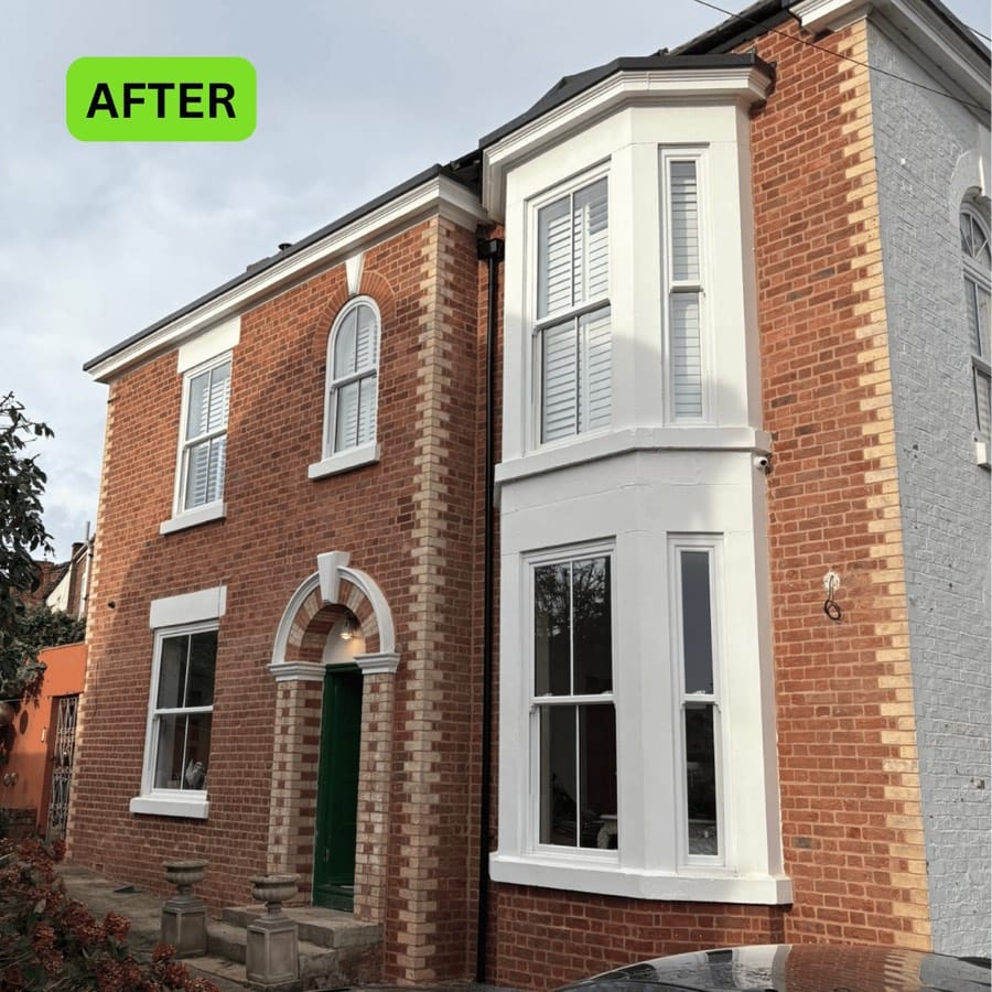 Period brick house after professional paint removal and brick cleaning